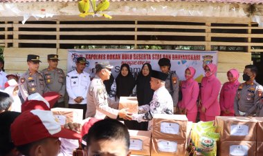 Kapolres Rohul Serahkan Bantuan Alat Tulis dan Sembako untuk SDS 028 Suka Dame Batang Kumu 