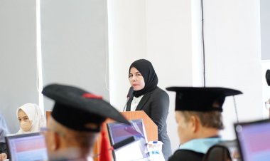 Jadi Lulusan Perdana Program Doktor UIR, Promovenda Yulfita Rahim Raih Predikat Terpuji