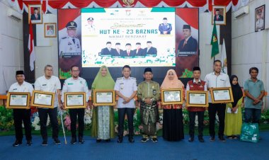 Peringati HUT Baznas Ke-23, Pj Bupati Kampar Salurkan Zakat Kepada 506 Kaum Dhuafa