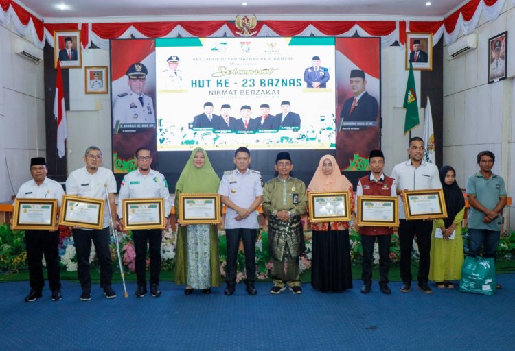 Peringati HUT Baznas Ke-23, Pj Bupati Kampar Salurkan Zakat Kepada 506 Kaum Dhuafa