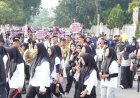 KPU Riau Gelar Jalan Sehat Menuju Pilkada Riau 2024 di Car Free Day Pekanbaru 17 November 2024