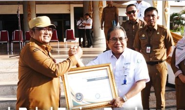 Pemkab Rohul Terima Penghargaan UHC dari BPJS kesehatan Wilayah II