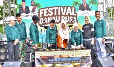 Pj Bupati Kampar Buka Festival Danau Rusa di XIII Koto Kampar 