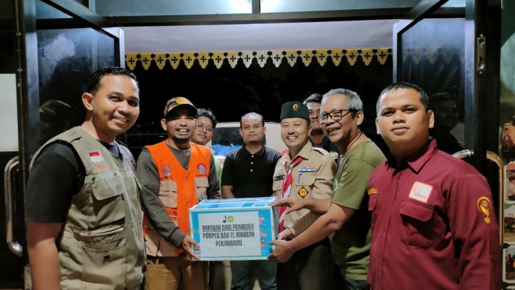 Pramuka Peduli Binawidya Serahkan Donasi Korban Bencana Sumatera kepada Kwarcab Pekanbaru 