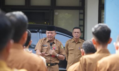 Kadiskominfo Kuansing Serahkan SPMT kepada PPPK