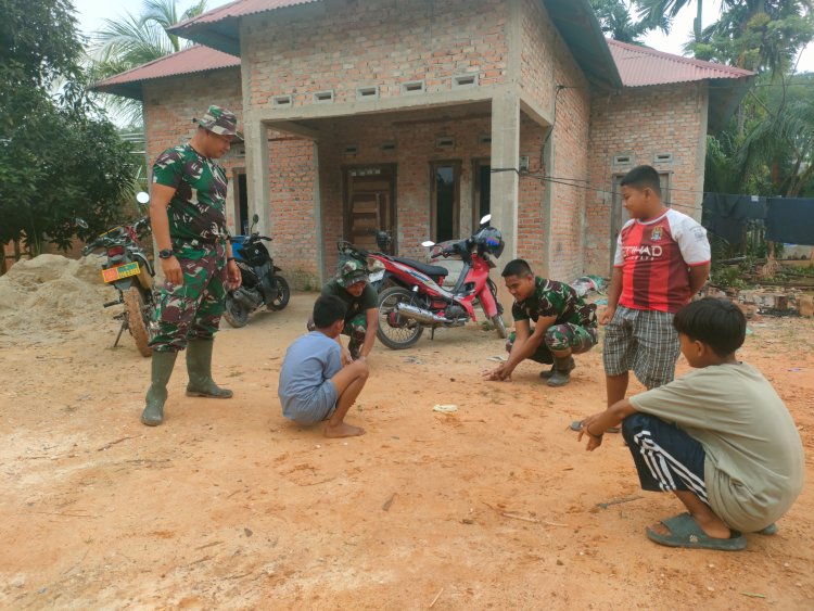 Satgas TMMD ke-127 Kodim 0301/Pekanbaru Ajak Anak-anak di Tuah Negeri Bermain, Jembatan Keakraban Prajurit TNI dan Rakyat